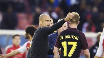 Manchester City manager Pep Guardiola and midfielder Kevin De Bruyne. Nils Petter Nilsson / Ombrello / Getty Images / August 7, 2016