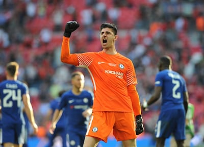 Thibaut Courtois celebrates his side's win over Manchester United in the FA Cup final in 2018. AP Photo
