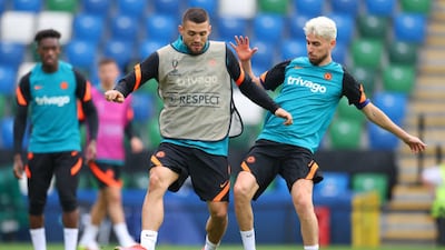 Mateo Kovacic battles for possession with Jorginho during Chelsea's training session at Windsor Park in Belfast.