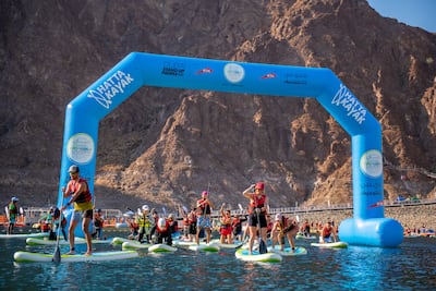 Stand-up paddleboarders during the 2024 Dubai Paddle at Hatta. Photo: Dubai Fitness Challenge