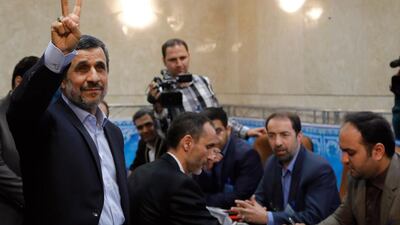 Former Iranian president Mahmoud Ahmadinejad, left, flashing the victory sign on April 12, 2017 during the surprise registration of his candidacy for the upcoming presidential election in May. Abdein Taherkenareh/EPA