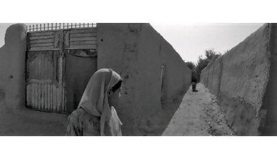 Children in the Maiwand District. Most homes in Afghanistan, particularly in the rural regions, are made of mud.