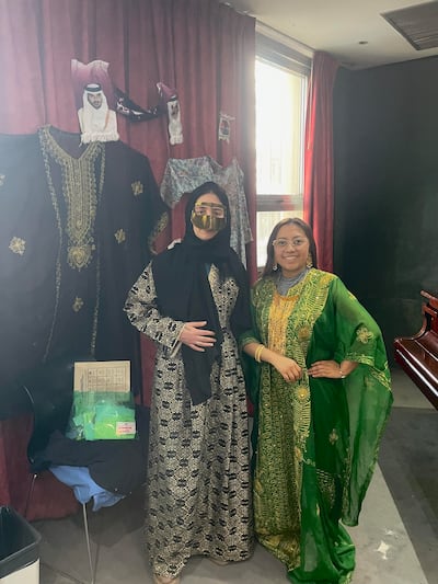 Students from the Astor Piazzolla Conservatory in Buenos Aires dress up in traditional Qatari clothes. Aveen Karim / The National