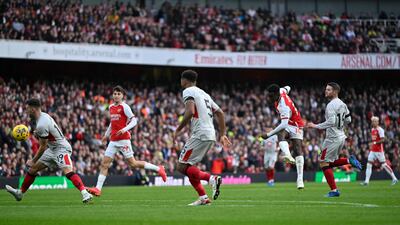 Arsenal's Eddie Nketiah scores their third goal and completes his hat-trick. Reuters