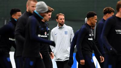 England manager Gareth Southgate watches over his side in training. They face Colombia in the second round on Tuesday. Paul Ellis / AFP