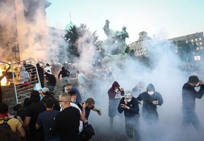 Tear gas was used by police and protesters threw rocks at officers. AFP