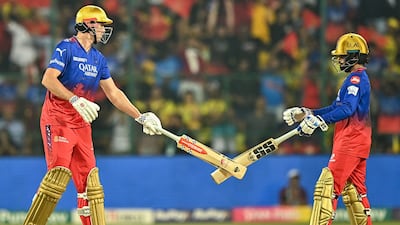 Royal Challengers Bengaluru's Cameron Green, left, and teammate Rajat Patidar. AFP
