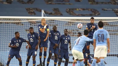 Manchester City's Champions League journey started with a 3-1 victory over Porto on October 21. Midfielder Ilkay Gundogan scored their second goal from a free-kick (above), with Sergio Aguero and substitute Ferran Torres netting the others. AFP