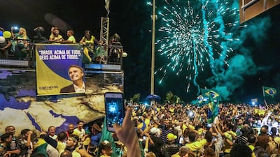Supporters of Jair Bolsonaro celebrate his victory in Rio de Janeiro. EPA