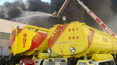 Firefighters tackle a blaze at a recycling warehouse in Al Quoz in November. Photo: Dubai Civil Defence