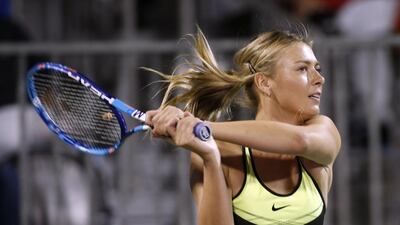 Maria Sharapova hits during a World Team Tennis exhibition to benefit the Elton John AIDS Foundation on Monday, October 10, 2016, in Las Vegas. Isaac Brekken / AP Photo