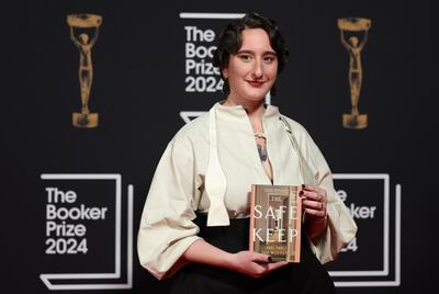 Shortlisted Dutch author Yael van der Wouden holds a copy of her book 'The Safekeep' at the 2024 Booker Prize ceremony in London on November 12. EPA