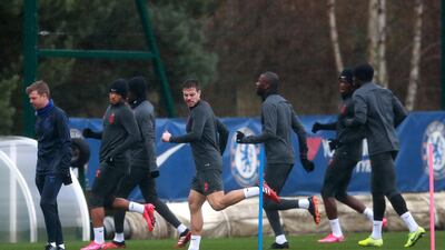 Chelsea's Cesar Azpilicueta (centre) and the rest of the team during a training session at Cobham. PA