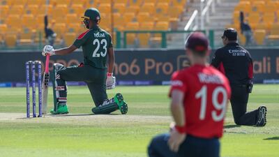 Bangladesh and England players take the knee against racism. AP