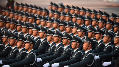 Soldiers of People's Liberation Army march in formation during the military parade marking the 70th founding anniversary of People's Republic of China in Beijing. AFP