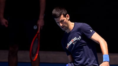 Novak Djokovic hits a return during a practice session ahead of the Australian Open at the Melbourne Park tennis centre in Melbourne. AFP
