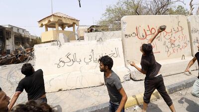 Iraqi protesters demonstrate against their government and the lack of basic services, in Basra. AFP