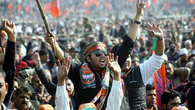 Supporters cheer as India's main opposition prime ministerial candidate, the Bharatiya Janata Party' s Narendra Modi, (not pictured) attends a public rally in Jammu, Kashmir. Jaipal Singh / EPA