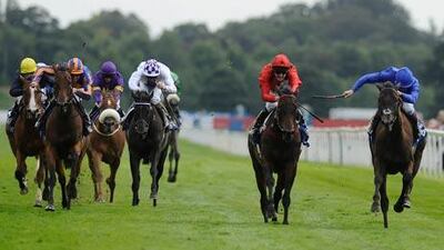Image Frankie Dettori rides Blue Bunting, right, to victory in The Darley Yorkshire Oaks at York yesterday.