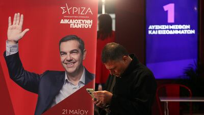 A Syriza party supporter in Athens reacts to the announcement of the exit polls. EPA