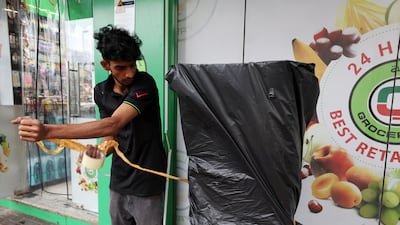 Covering your property from the rain in Satwa, Dubai. Chris Whiteoak / The National