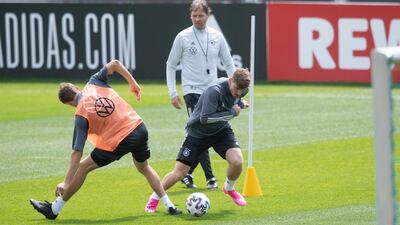 Thomas Muller (L) and Timo Werner in action. Getty