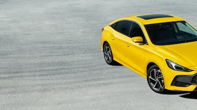 The sedan sits on a drifting track