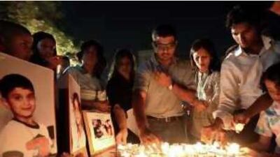 A candlelight vigil at St Mary's Church in Dubai last year for Nathan and Chelsea D'Souza, who died of food poisoning.