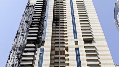 The Sulafa Tower building sustained significant damage in a fire that spread over several floors. Antonie Robertson / The National