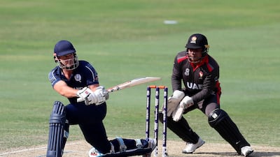 George Munsey produces one of his many reverse sweep shots for Scotland against the UAE at the T20 World Cup Qualifier. Chris Whiteoak / The National