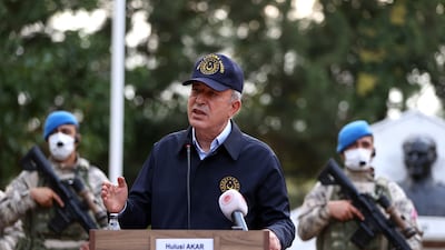Turkish Defence Minister Hulusi Akar speaks during a visit with Turkish Armed Forces command on the Greek border in Edirne on August 29. AFP / Turkish Defence Ministry
