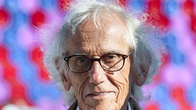 Artist Christo, 83, with his new installation at the Serpentine Gallery in London on Sunday June 24. He is thought to be one of the world's richest living artists. Gustavo Valiente / The National