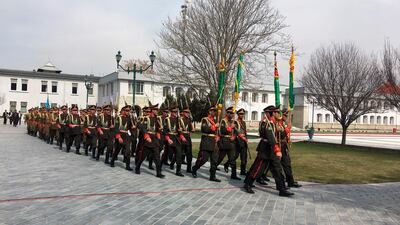 Afghan honour guards walk ahead of the oath inauguration ceremony of Afghanistan's President Ashraf Ghani, at the Presidential Palace in Kabul. AFP