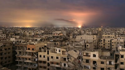 Smoke billows following a regime air strike on the besieged Eastern Ghouta region on the outskirts of the capital Damascus. Ammar Suleiman / AFP Photo