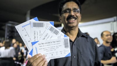 DUBAI, UNITED ARAB EMIRATES -Rudolph Pinto excited to get Papal tickets for his family at St. Mary's Catholic Church, Oud Mehta. Leslie Pableo for The National for Patrick Ryan's story