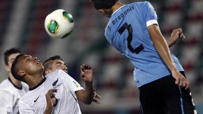 Uruguay's Joel Bregonis heads the ball. Karim Sahib / AFP Photo
