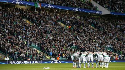Celtic huddle before their Champions League match against Swedish club Malmo on Wednesday night in Glasgow. Carl Recine / Action Images / Reuters