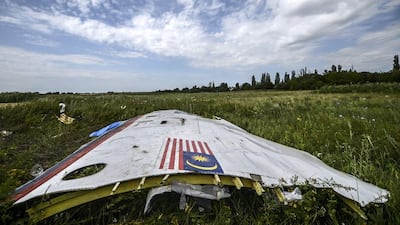 A piece of the wreckage of the Malaysia Airlines flight MH17 lies in a field near the village of Grabove, in the region of Donetsk. The missile which brought down Flight MH17 two years ago over eastern Ukraine was transported into the area from Russia, a Dutch-led investigation found on September 28. Bulent Kilic / AFP