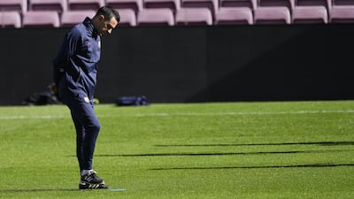 Barcelona manager Xavi Hernandez leads a training session. EPA