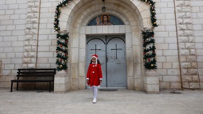 A girl at the Holy Family parish in Gaza city. AFP