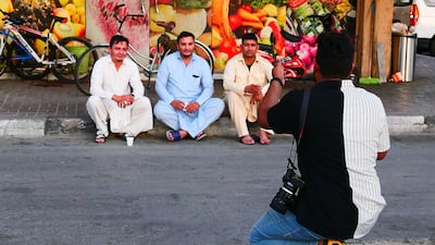 Residents of the Toyota building pose for photos.