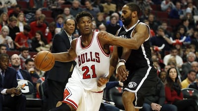 Jimmy Butler, left, is one of the best talents in the NBA and Chicago have managed to tie him down to a long-term deal. Andrew Nelles / AP Photo
