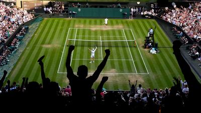 Jannik Sinner celebrates victory over Carlos Alcaraz that secured the world No 1 his first Wimbledon title. PA