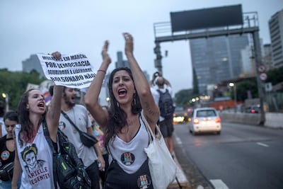 Women protest against the far-right presidential candidate. Getty Images
