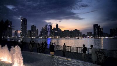 Sharjah-based Invest Bank has faced losses on its legacy exposure to property and construction sectors . Reem Mohammed / The National