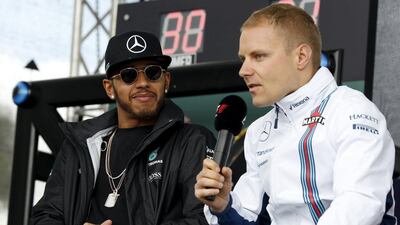 Valtteri Bottas speaks before the Australian Grand Prix in 2016 along with Lewis Hamilton, who will be his Mercedes teammate in 2017. Brandon Malone / Reuters