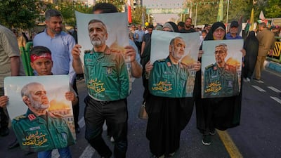 Portraits of killed Iranian commanders were held up by demonstrators in Tehran during a Shiite holiday. AP