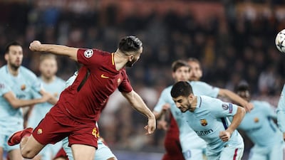 Roma's Kostas Manolas scores against Barcelona during their Uefa Champions League quarter-final second-leg match in Rome. Riccardo Antimiani / EPA