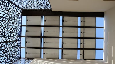 Looking up to the solar PV panels on the roof of the EcoVilla.