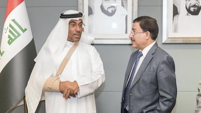 Faisal Al Haimus, chairman of TBI, with ADGM chairman Ahmed Al Sayegh, at the opening of the bank's representative office in the Abu Dhabi free zone. Antonie Robertson / The National